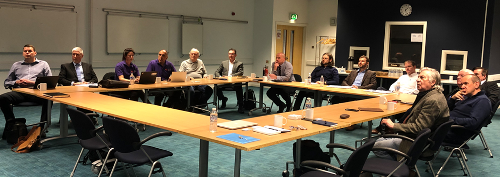 Conference room with attendants in Wales