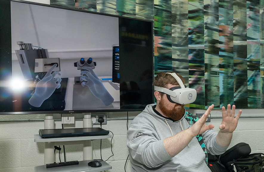 Person trying out virtual reality goggles