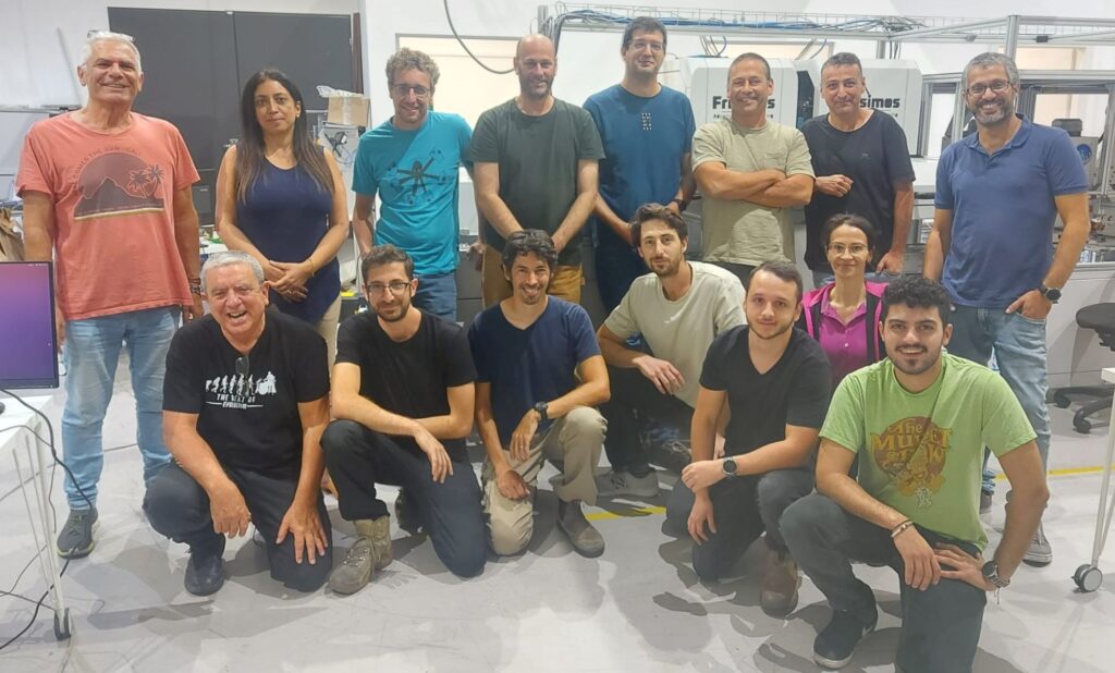 The image shows the Frisimos team